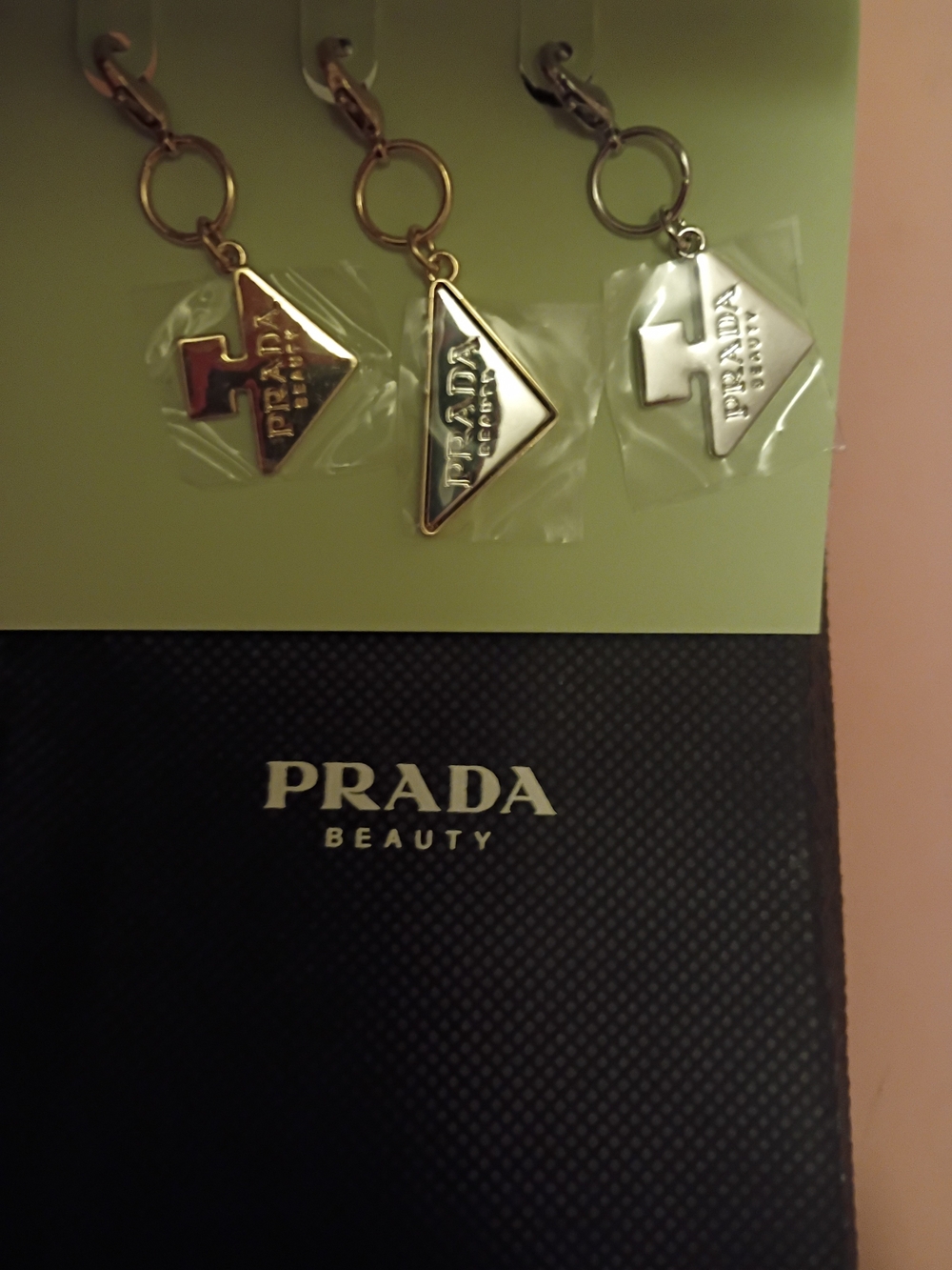 Prada Gold Triangle Logo Keychain Set